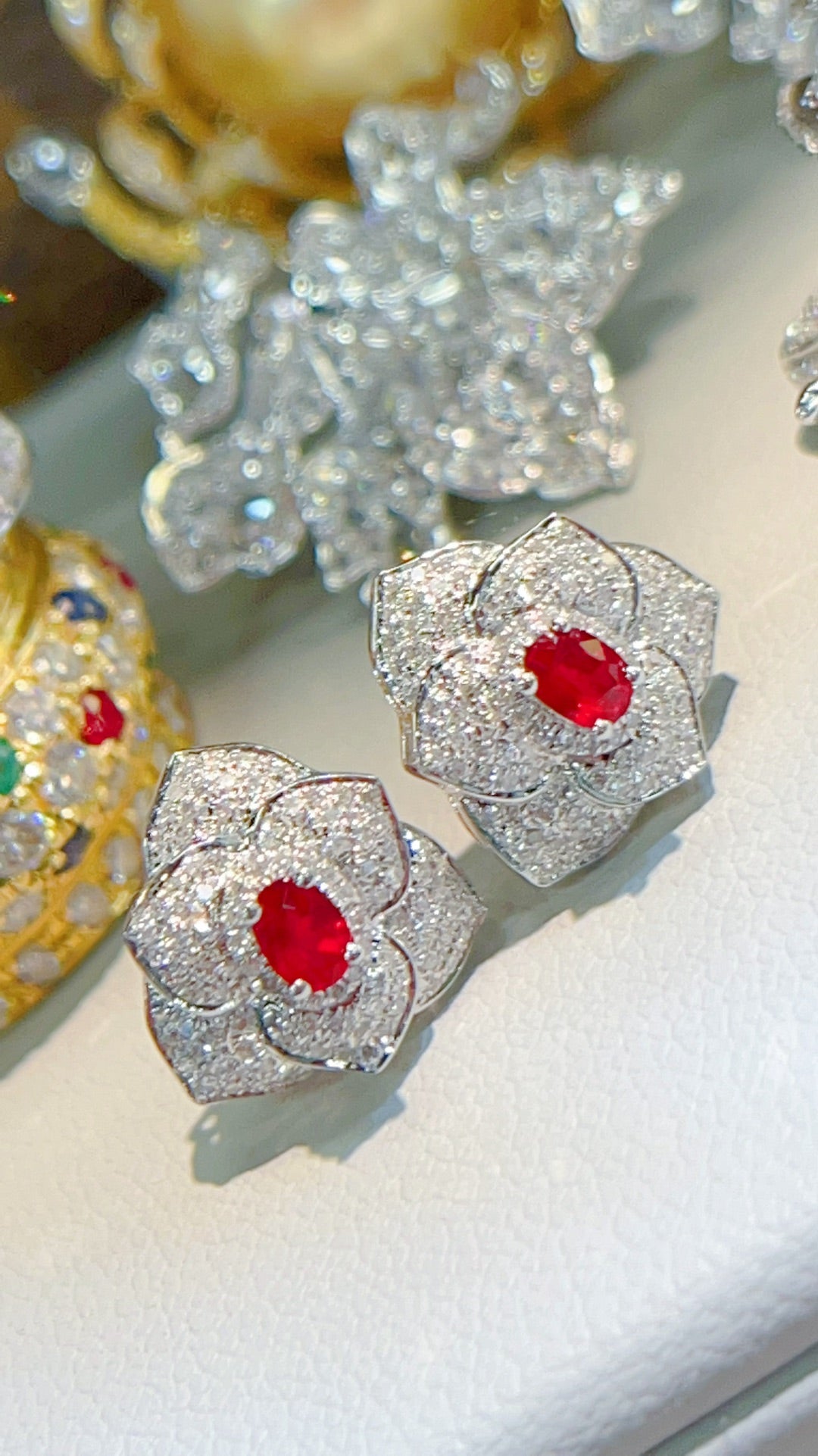 Diamond studded ruby stud earrings