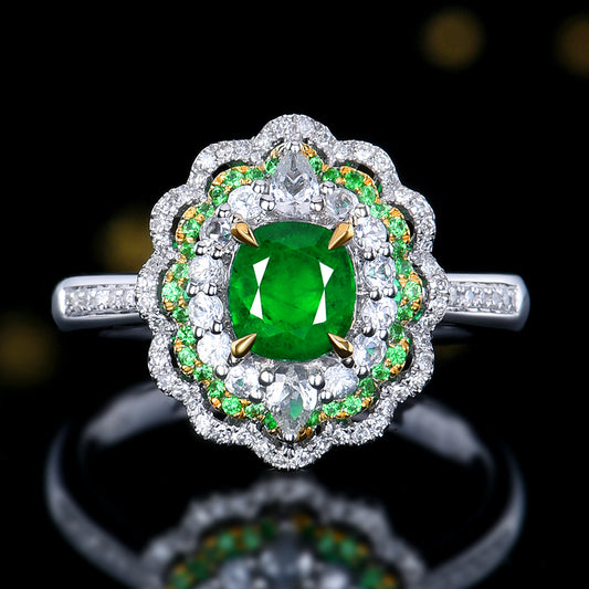 Natural Muzo green emerald in 18K gold