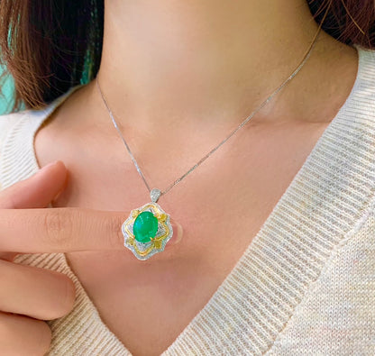 3.85 carat emerald ring/pendant in wood zo